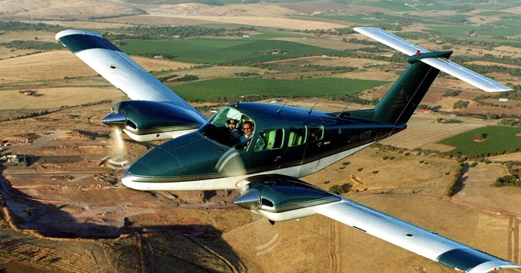 Aircraft flying over farms
