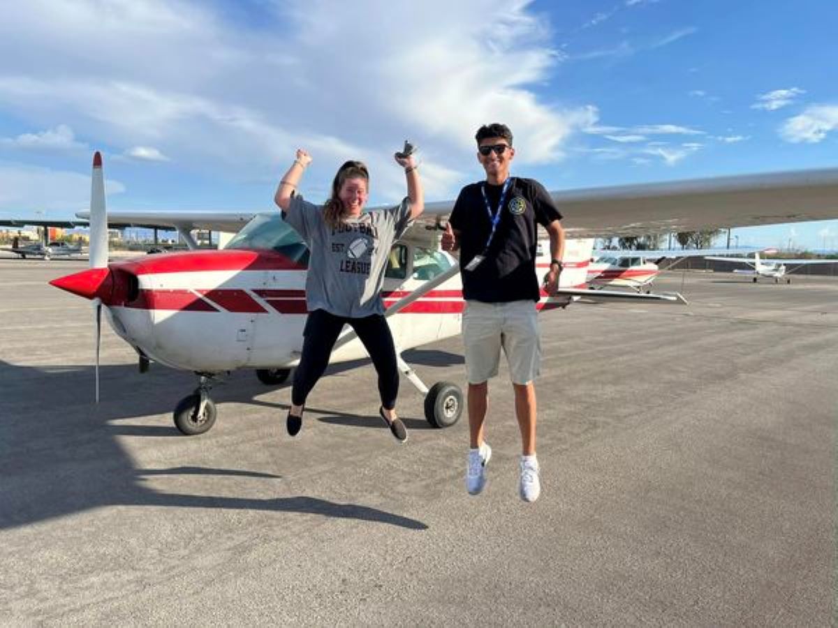 Student and CFI celebrating the student's first solo flight