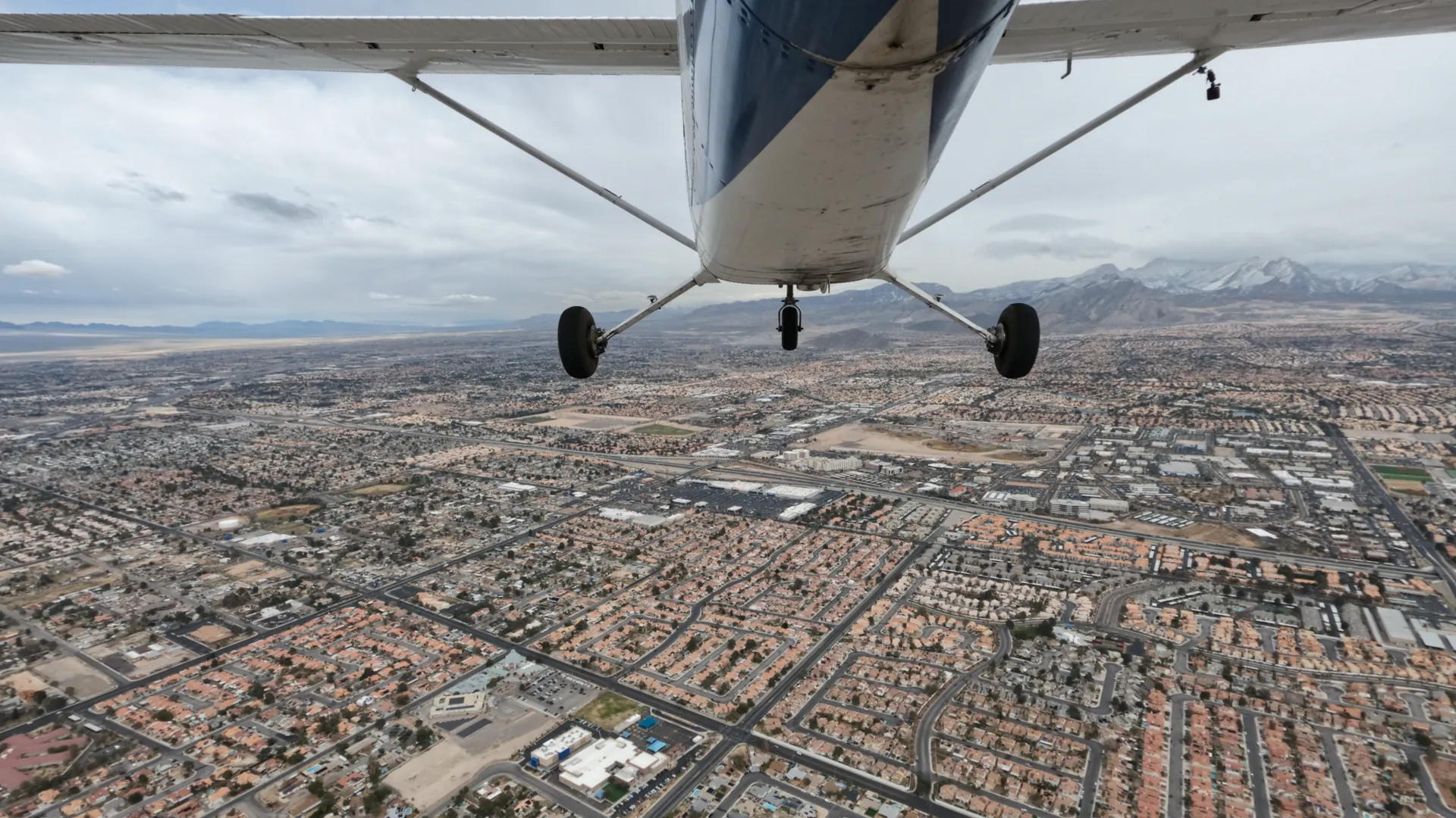 Airplane flying over city